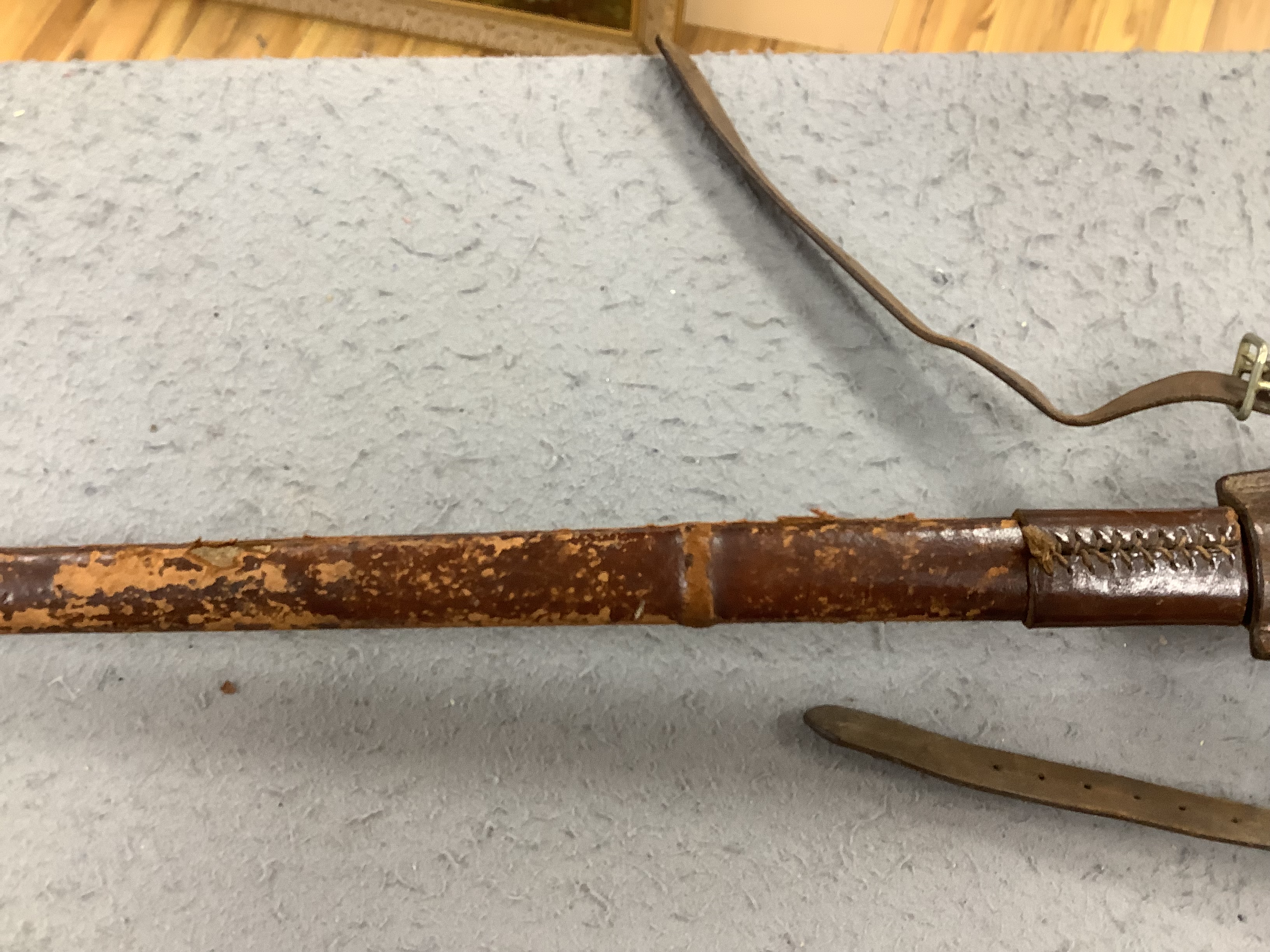 A Victorian 1897 pattern infantry officer's sword, maker Robert Mole & Sons, Birmingham, marked War and India offices, with scabbard and leather hanger, blade 82cm